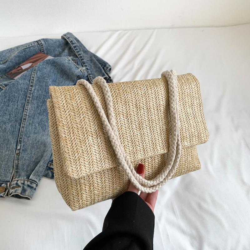 

New straw woven bag big tote bag 2025 spring and summer new solid color handbag single shoulder oblique span bag versatile casual tide хаки