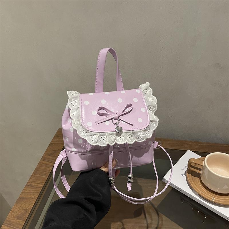 Schoolbag Korean cute college style backpack 1011 spring new commuter small backpack portable niche polka dot handbag