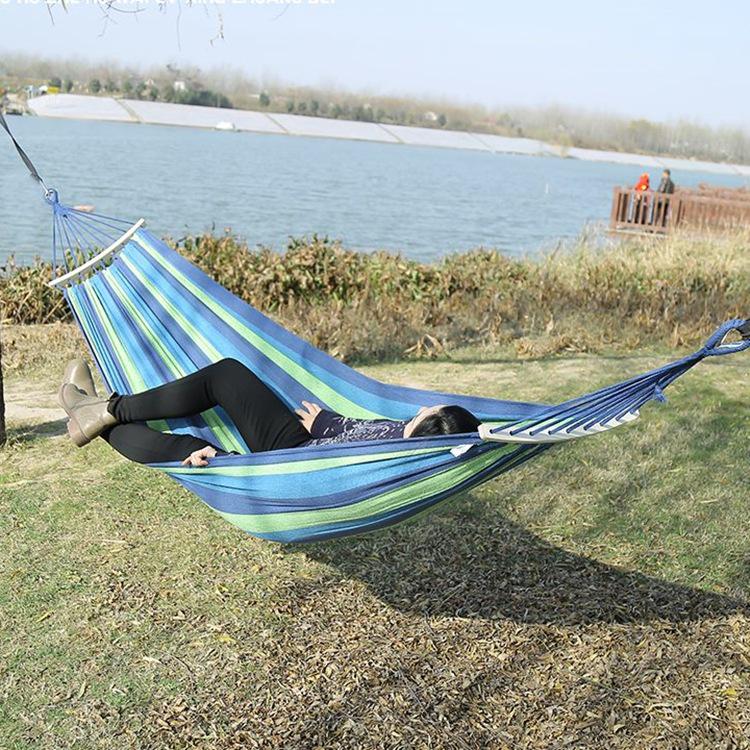 Outdoor Double-Thick Canvas Hammock with Bent Wood Design and Anti-Rollover Feature