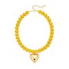 Adjustable Beaded Pendant Necklace with Rounded Resin Beads, Heart-Shaped Center Pendant, Extension Chain, and Lobster Clasp