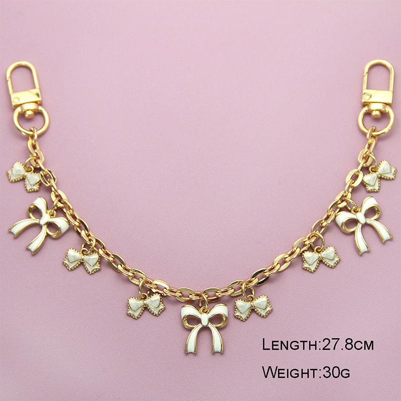 

Temperament Bow Chain Jewelry Bag Hanging Jewelry Bag Charm Bag Accessories Bag Decoration Pendants as the picture