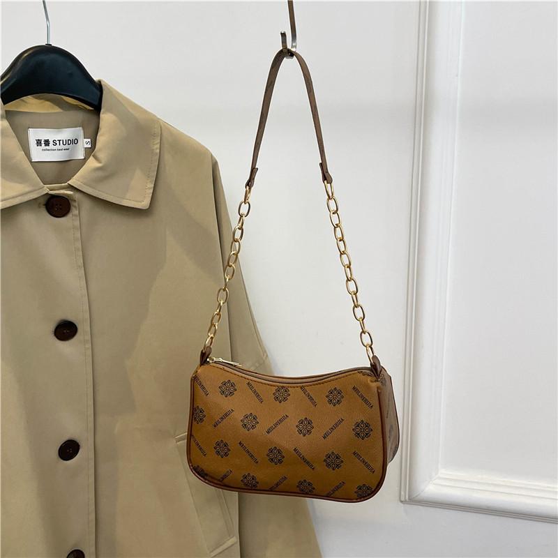Fashionable New Moon Bag Stylish Casual Chain Handbag For Women In White And Brown Tones Yellow Brown