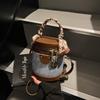 Minimalistická crossbody taška s barevnými bloky: Dámská válcová kabelka na podzim/zimu 2025 - Pokročilá, módní, všestranná