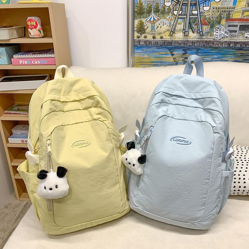 Simple Solid Color Letter Embroidery Student Backpack With Plush Pendant For Middle School Students
