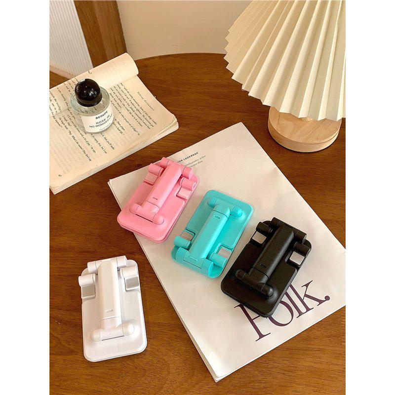 Foldable Phone & Tablet Stand: Portable, Adjustable & Universal