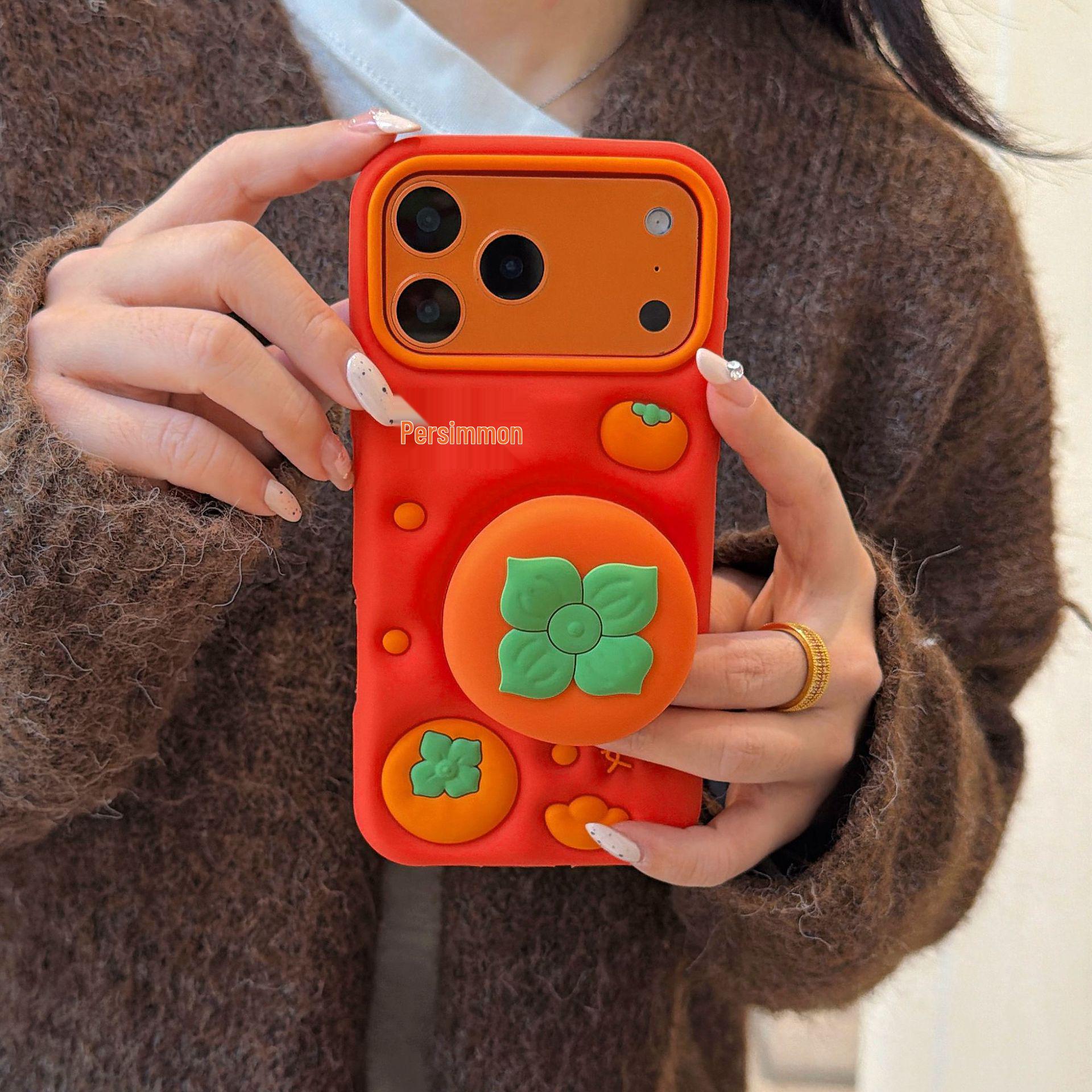 

Good Omen Festive Persimmon Phone Case: Soft Rubber for Apple iPhone 17 Pro, Red Background iPhone 16