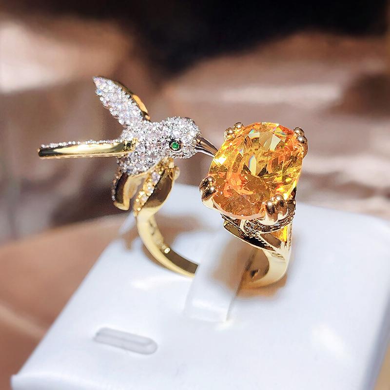 High-End Hummingbird Ring: Santa Maria Aquamarine-Look with Colored Gemstones for Women