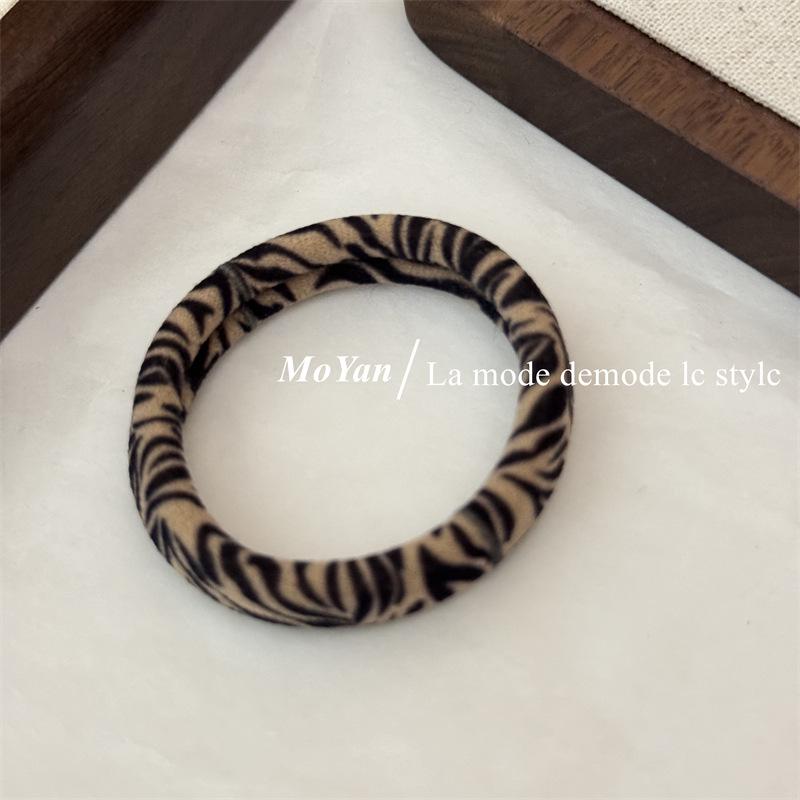 Высокоэластичная резинка для хвоста с леопардовым принтом - Прочная бесшовная резинка для женщин