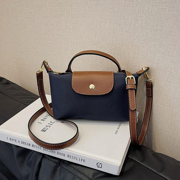 Elegant Lightweight Crossbody Handbag: Versatile Women's Commuter Bag with Phone and Coin Pockets