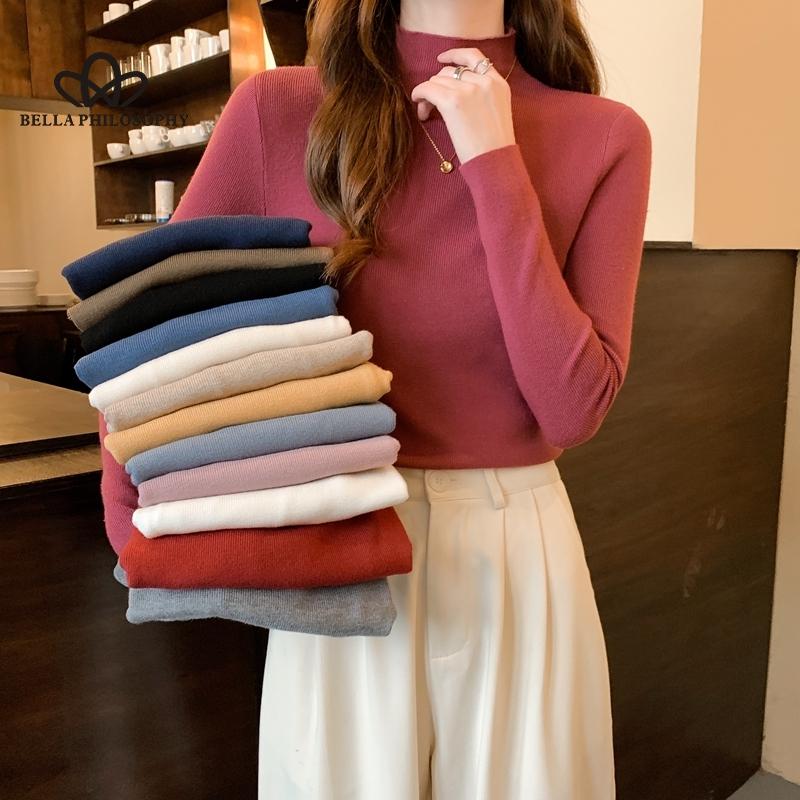 Nuevo invierno ajustado tejido de punto Color sólido cuello redondo señoras moda camisa por el trasero suéter mujer ropa