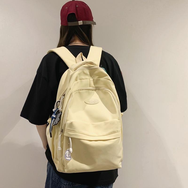 School bag female Japanese junior high school student backpack Korean version solid color soft girl girl backpack simple college backpack
