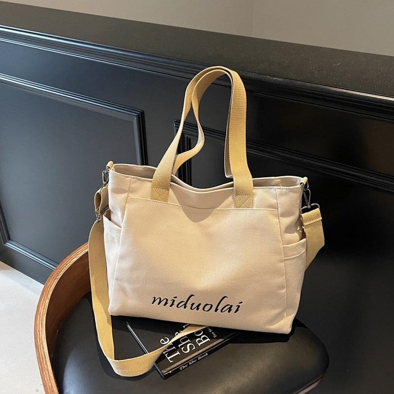 

Large capacity portable canvas bag, women s new casual shoulder messenger bag, student class tote bag