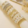 European and American jewelry niche design cross bracelet set sweet cool beaded stacked shell pearl bracelet