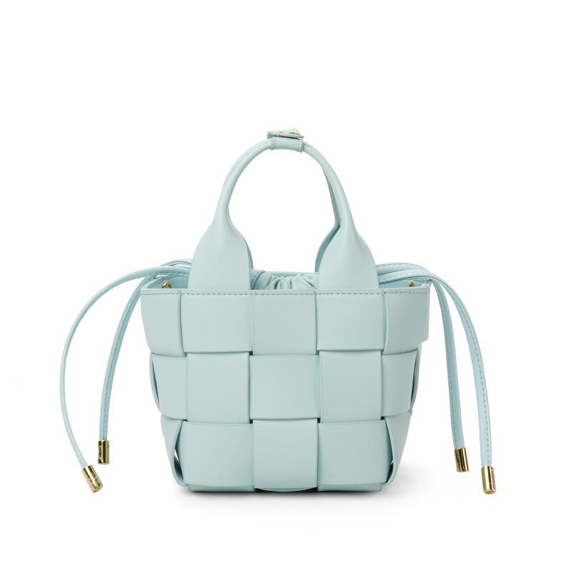 New high-end leather woven vegetable basket women's bag niche design women's soft cowhide portable messenger bucket bag