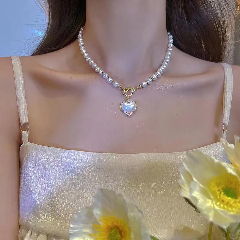 Japanese and Korean ins new super fairy temperament imitation pearl love necklace cold wind sweet simple OT buckle collarbone chain