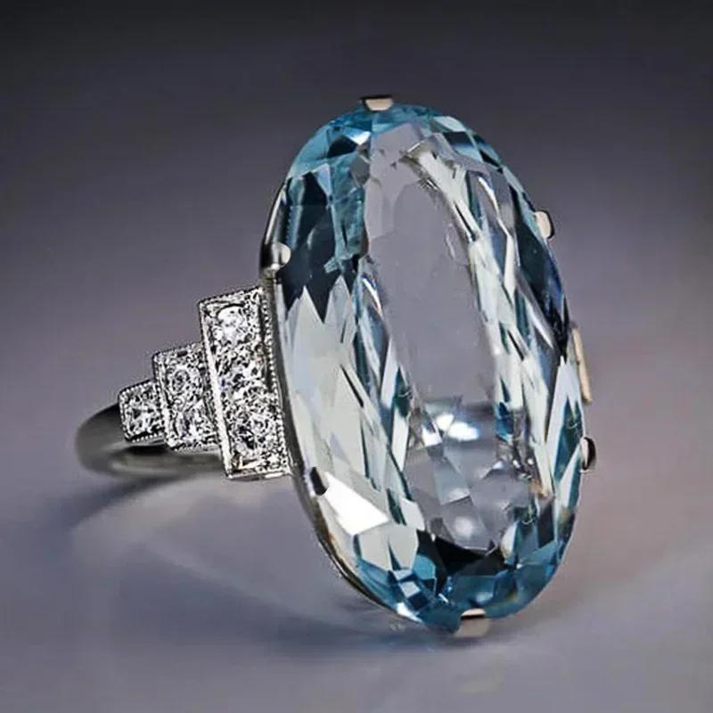 Nuovo Anello da Donna Hyperbole per Festa Cocktail Con Enorme Zircone Cubico Azzurro Montatura a Griffa Regalo di San Valentino per Moglie