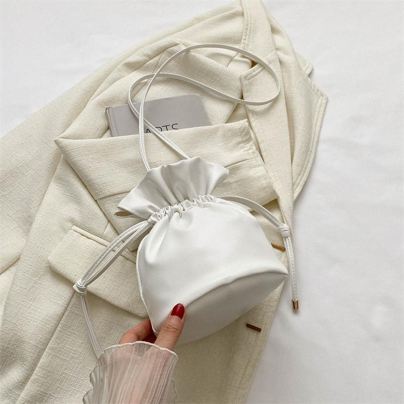 Fashionable Simple Bucket Bag For Women With Soft Structure Available In Black White Brown And Fuchsia