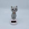 Solar-Powered Wiggling Cat Dashboard Figurine - Creative Cartoon Ornament & Children's Toy Gift