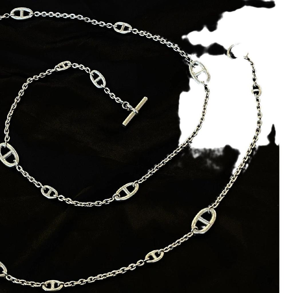 Versatile Light Luxury Titanium Steel Women's Necklace with OT Buckle - Long Chain Pig Nose Design Temperament Accessory.