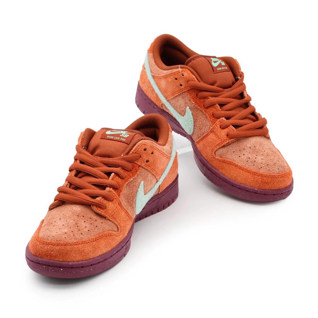 DV5429-601 Nike SB Dunk Low Mystic Red Rosewood Emerald Rise Rugged (Men's)