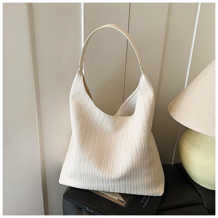 

Textured bag women s spring and summer new trendy large capacity fashionable simple popular canvas shoulder tote bag білий