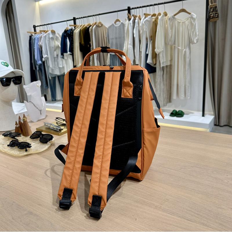Značka módního návrháře Dámský a pánský batoh Trendy styl Taška na notebook 15,6 palce PU kůže Businessový ruksak Dámská školní taška