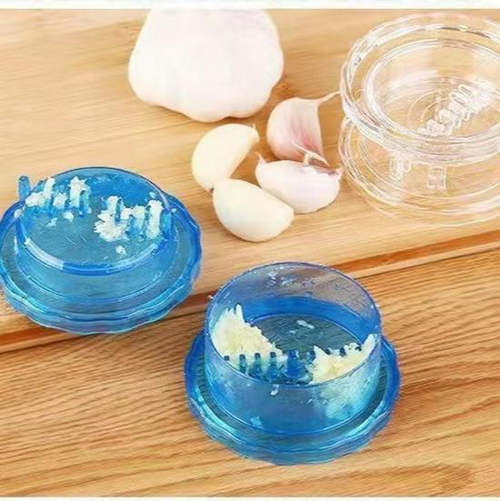 Compact Plastic Garlic Tool: Mincer, Chopper, Press, Masher, Grater, and Crusher for Creative Kitchen Use