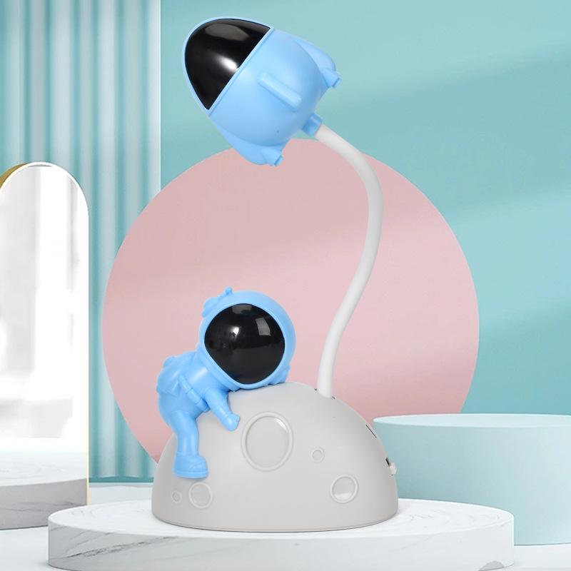 Astronaut LED Night Light: Moon Man Bedside Lamp for Student Dorms, Reading, and Desk Atmosphere.