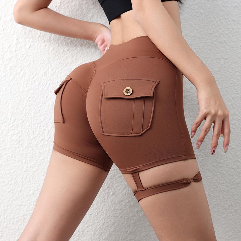 

Sports shorts European and American work pockets hip lift fitness shorts women s tight leg ring sports pants peach hip yoga pants S темно-коричневого кольору