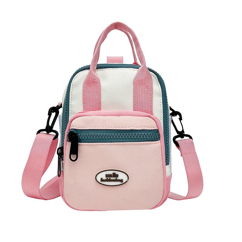 Mini small backpack women's 2025 new contrasting color shoulder bag shopping out high value mobile phone bag cute messenger bag