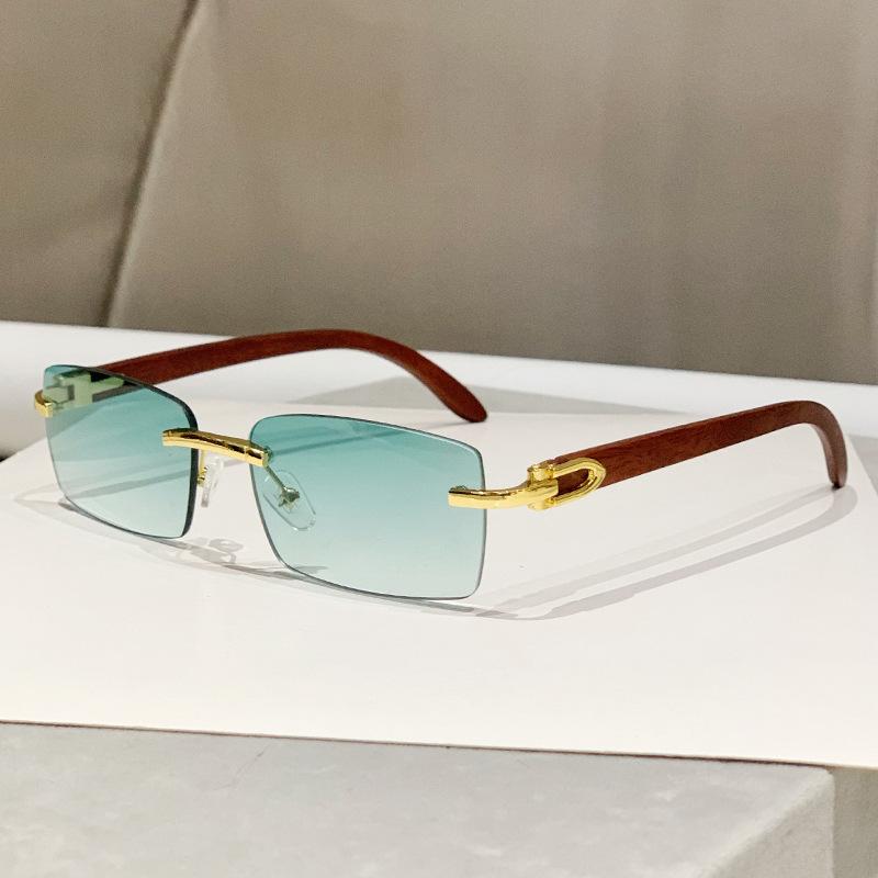 New frameless trimmed personalized sunscreen sunglasses catwalk travel fashion versatile wood grain legs advanced sunglasses
