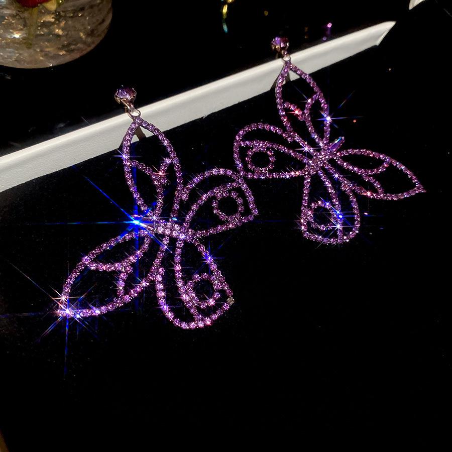 

Сережки-пусети Серце з цирконієм та стразами Срібна голка - Дизайн високої моди