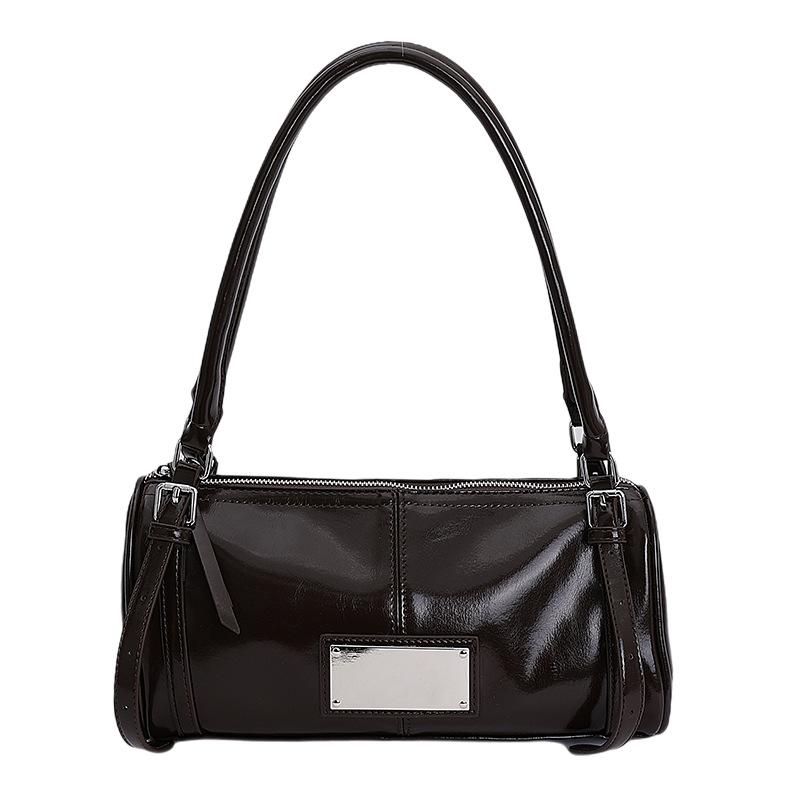 

Korean wax oil leather cylinder bag versatile commuter shoulder armpit bag women s 2025 new casual baguette bag