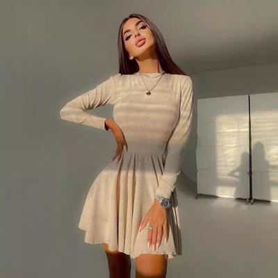 Women's Solid Color Round Neck Back Hollow A-line Long Sleeved Dress