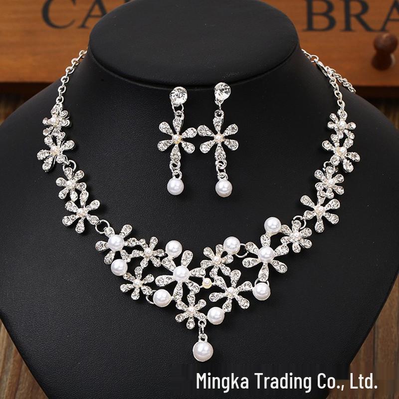 Elegant Pearl and Crystal Jewelry Set: Necklace, Earrings, & Bracelet for Brides