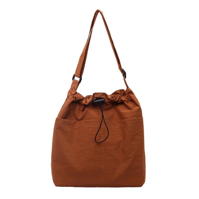 Rear zipper drawstring casual bag women's new fashion large cloth bag large capacity tote bag class commuter messenger bag