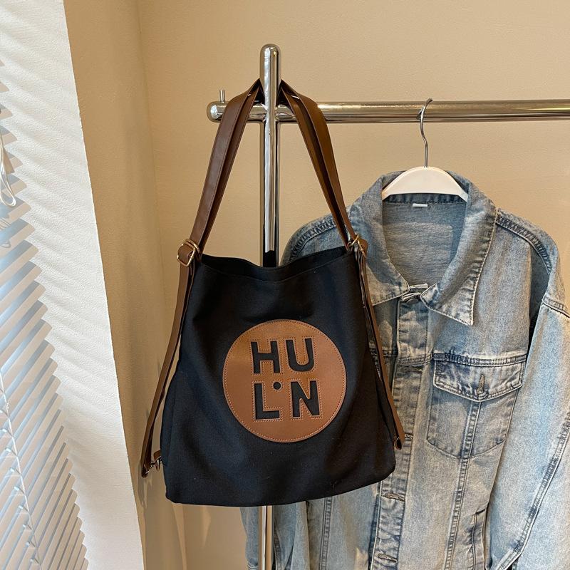 

Canvas bag women s 2025 new fashionable large-capacity multi-purpose backpack student class commuting shoulder tote bag чёрный