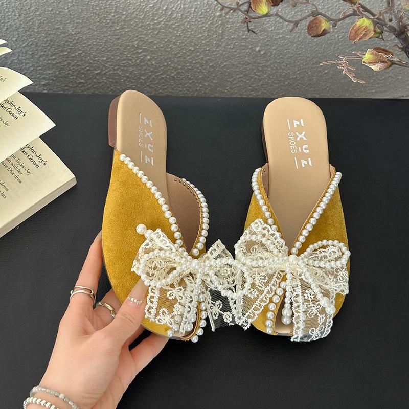 Baotou Halbschuhe Damen 2025 Frühling und Sommer neu Perle Schleife Mode weiche Sohle Fischmaul Tragen Keilabsatz Sandalen