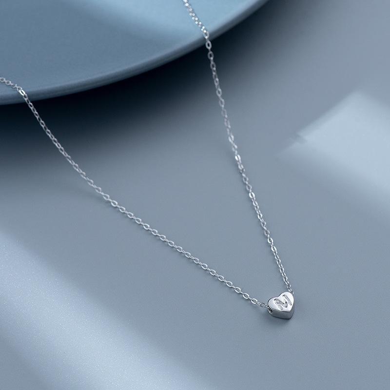 S925 Silver Heart-Shaped Initial Necklace - Korean Style Clavicle Chain with Trendy Peach Heart Design.