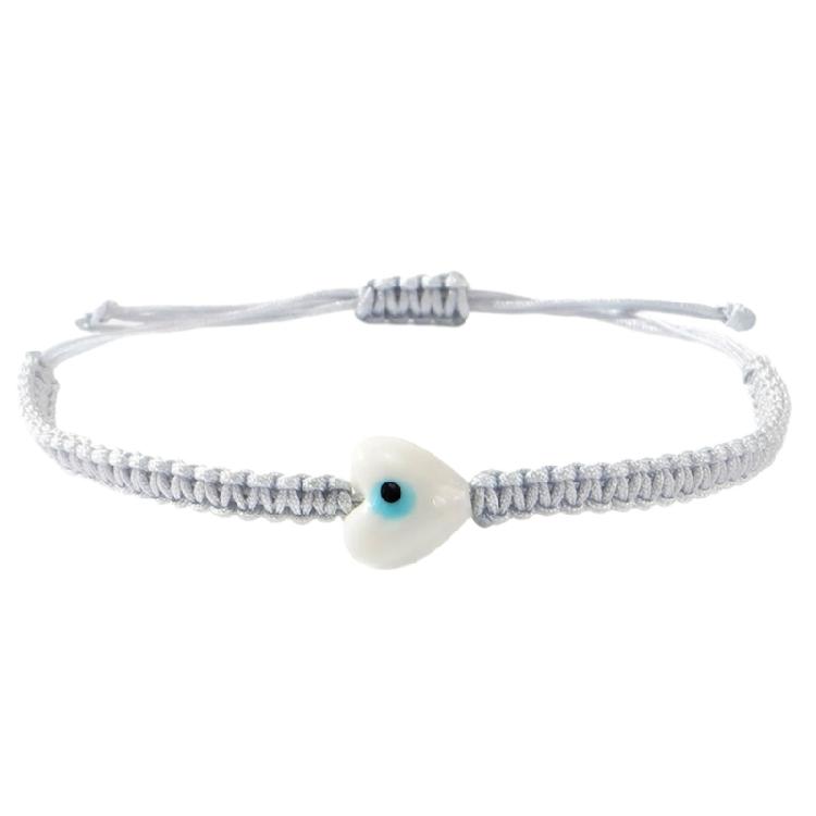 Elegant Braided String Wristband With Spiritual Eye Symbol Versatile Layering Jewelry for Everyday Outfits