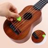 1 Peça Aprendizagem Educacional Presentes 26/35Cm Guitarra Infantil 4 Cordas Instrumento Musical Com Palhetas Simulação Yukrili Brinquedo Musical