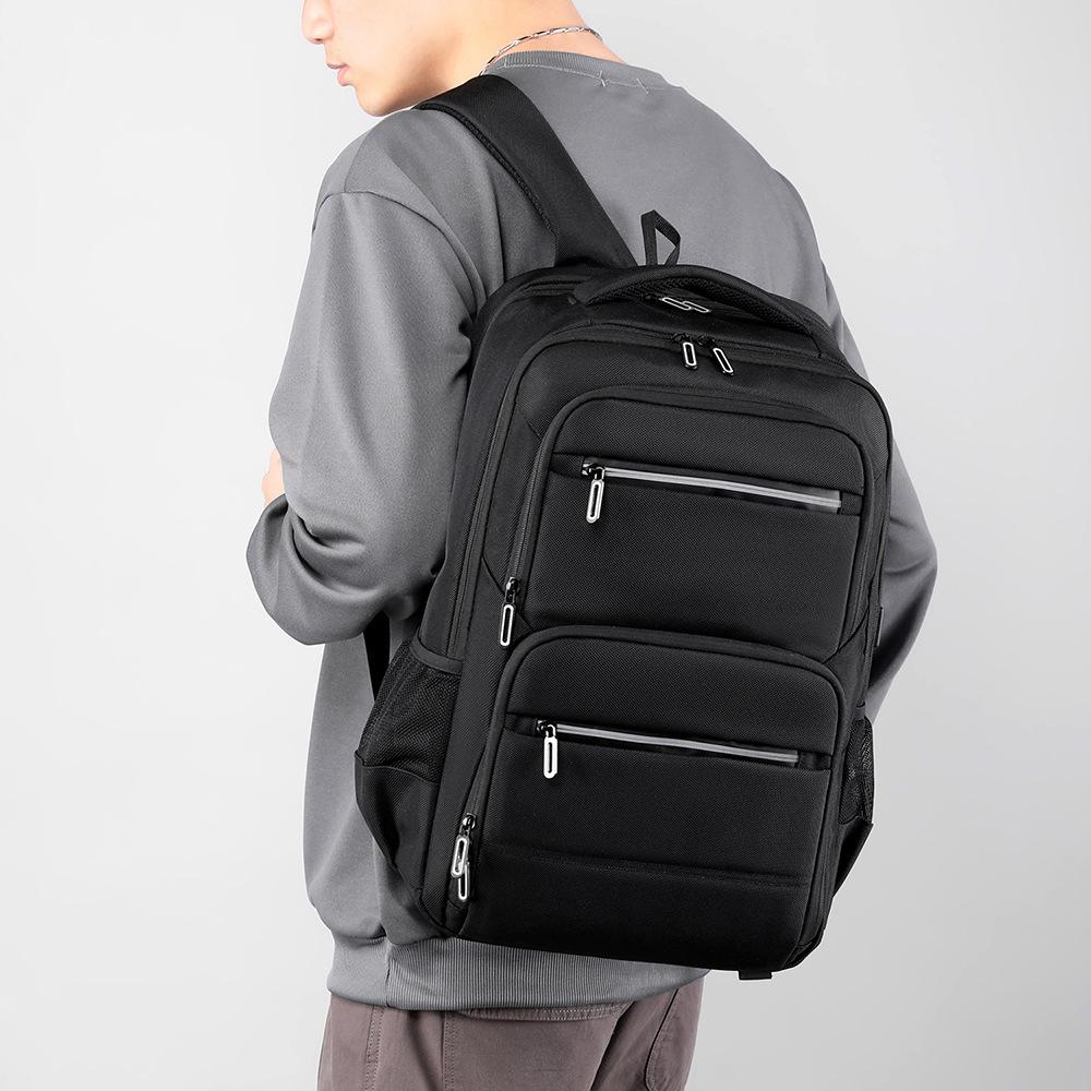 Neuer Unisex-Rucksack, einfarbig, wasserdicht und atmungsaktiv, Business-Mode, lässig, All-Match, Tagessparrucksack