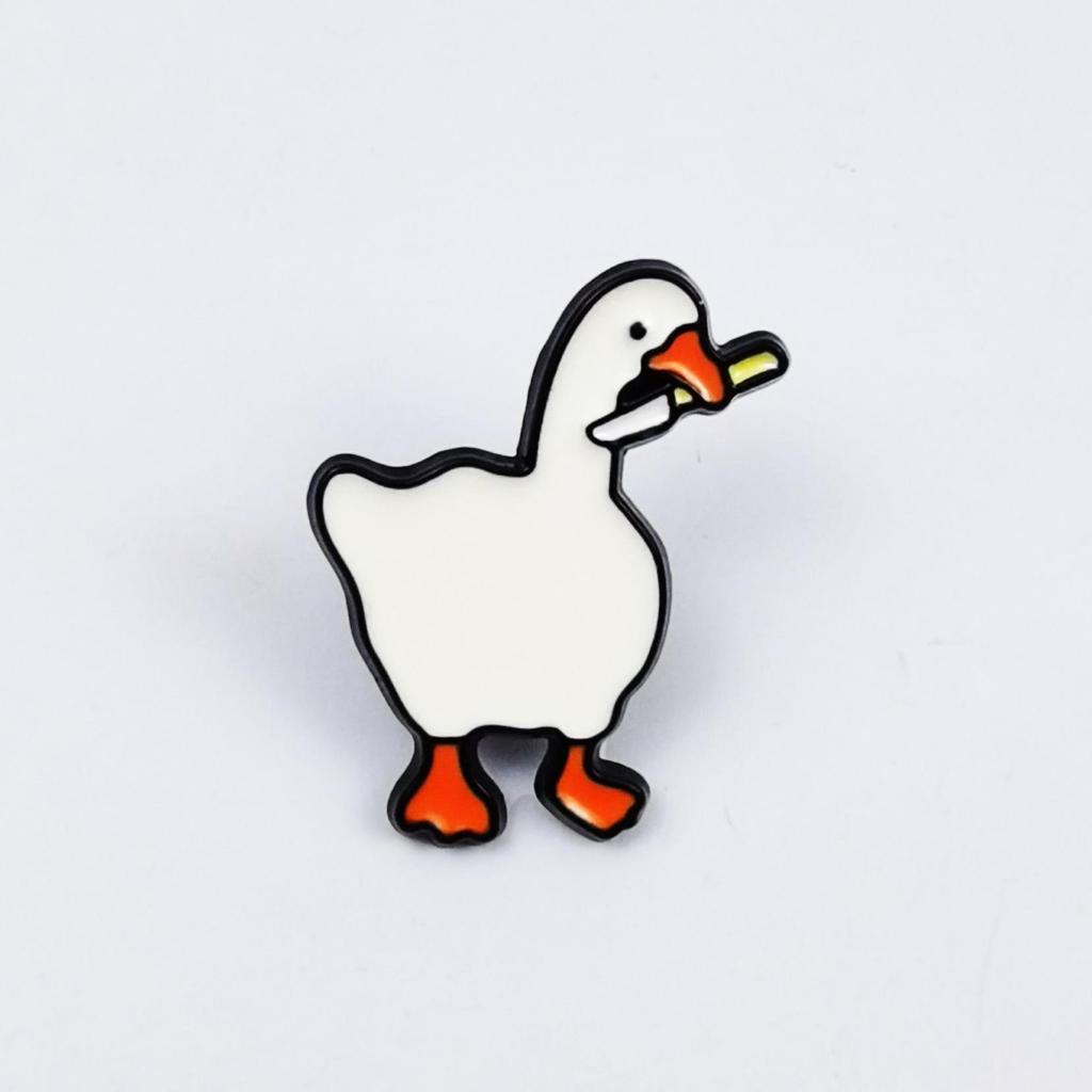 Charming Goose Pose Brooch: Cute Cartoon Animal Metal Badge with Drip Oil Finish.