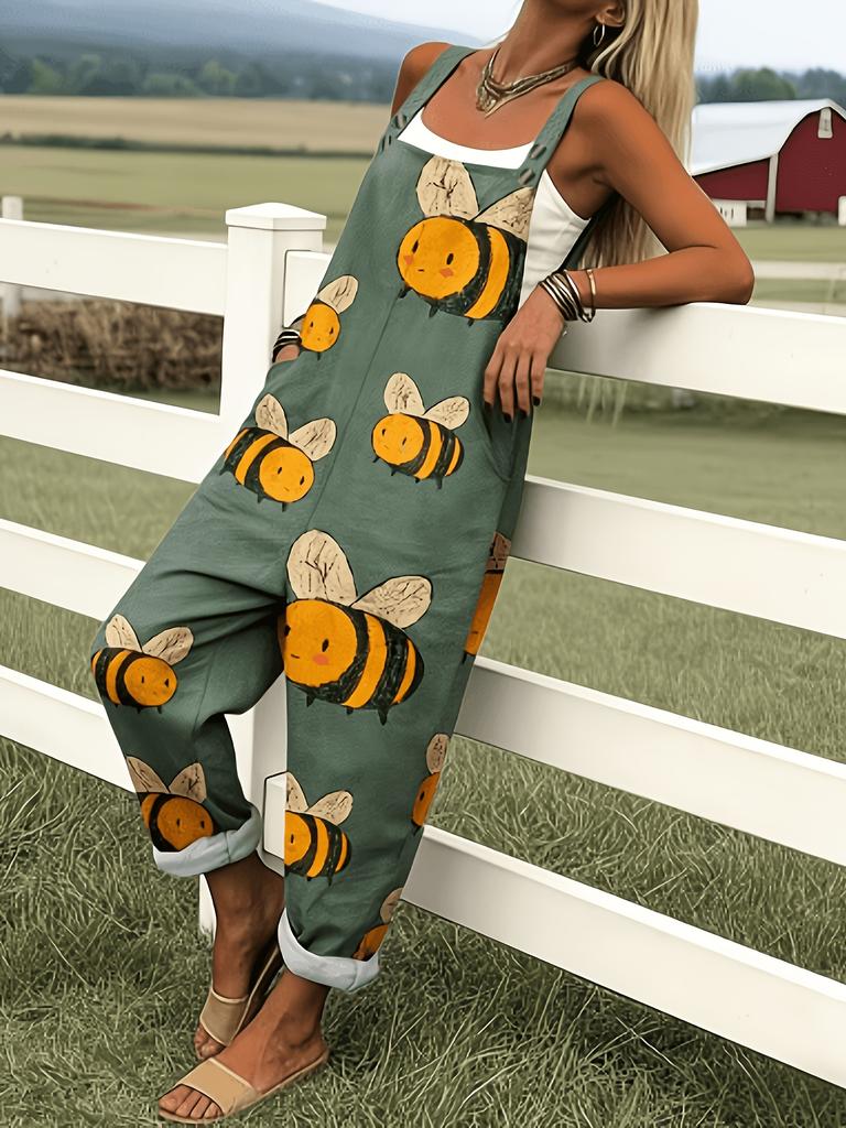 Green jumpsuit with cartoon bee pattern