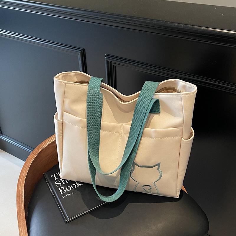 Large capacity canvas bag women's new fashion shoulder lightweight tote bag student class commuter bag