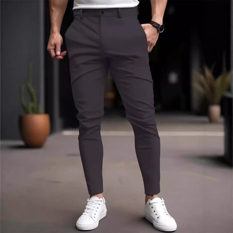 Men Solid Color Elastic Casual Tapered Long Pants