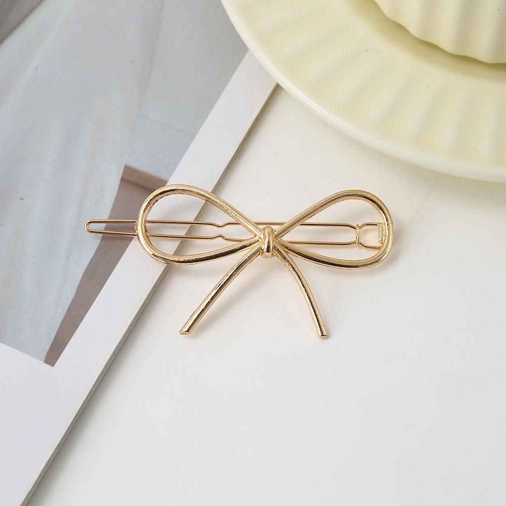 Elegant Smooth Metal Bow Hair Clip - European  American Style Women s Accessory золотой
