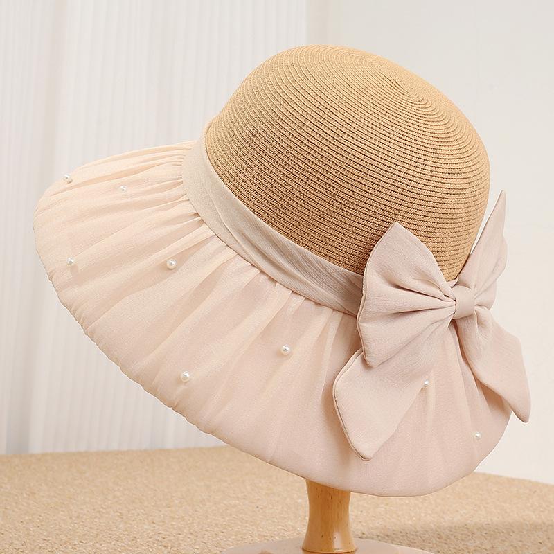 Spring and summer new women's straw hat big brim sun hat French pearl bow versatile sun protection hat travel