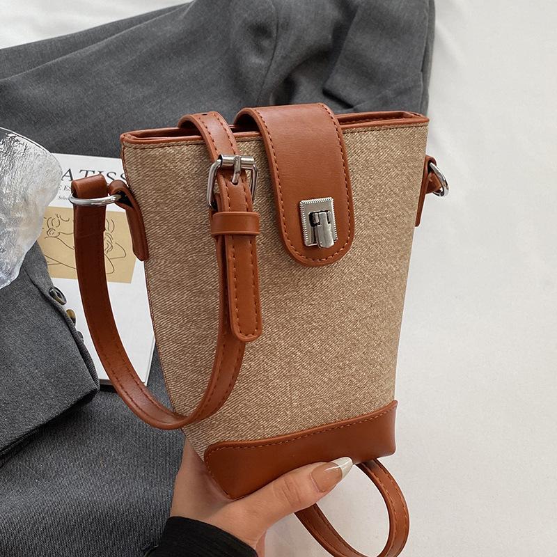 This year's popular niche design contrasting color temperament bucket bag women's casual versatile fashion commuter style messenger bag