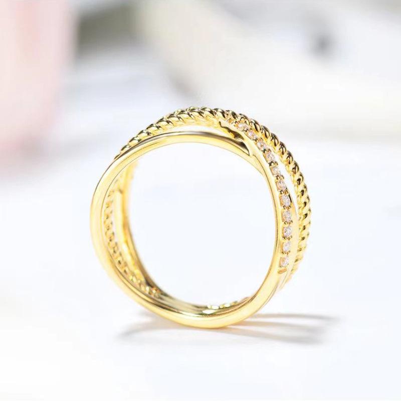European and American retro cross ring women, Korean version of fashionable gold design cold ring, hollow multi-layer model